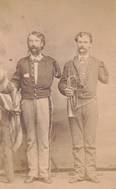 Amputations: Civil War veterans George Washington Brown of Co. B, 157th Pennsylvania Infantry Regiment and Edwin Silas Kellogg of Co. A, 89th New York Infantry Regiment in uniforms with trumpet