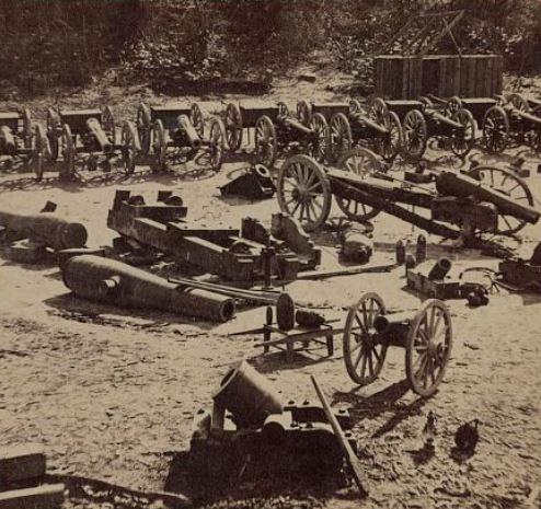 row of caissons, mounted and unmounted cannons awaiting shipment in Broadway Landing, Virginia