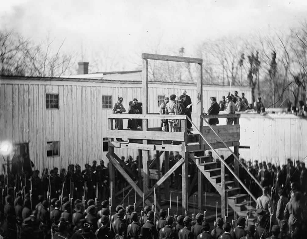 Reading the death warrant to Captain Wirz of Andersonville on the scaffold