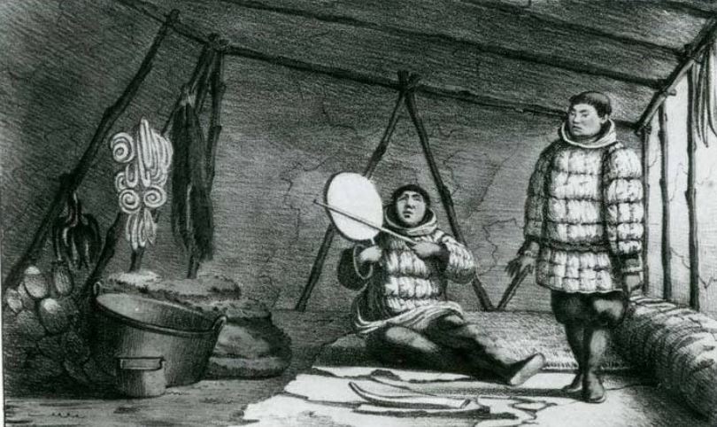 Yupik men, inside a house on Saint Lawrence Island, Alaska